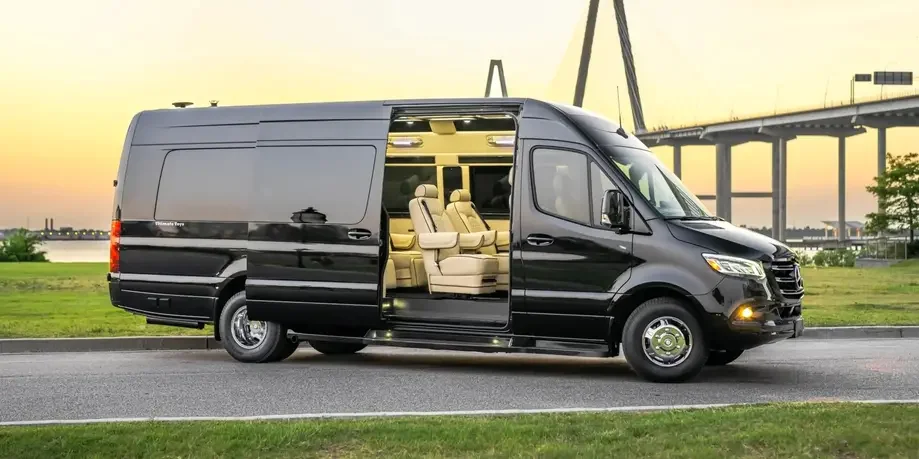 The Monarch Maybach luxury Sprinter, front three-quarter view, Excalibur Executive