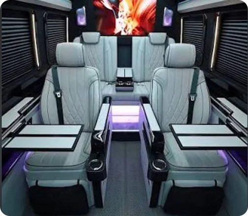 The Avalon — black Mercedes-Benz Sprinter limousine in side profile at dusk with blue underglow, Excalibur Executive, Oklahoma